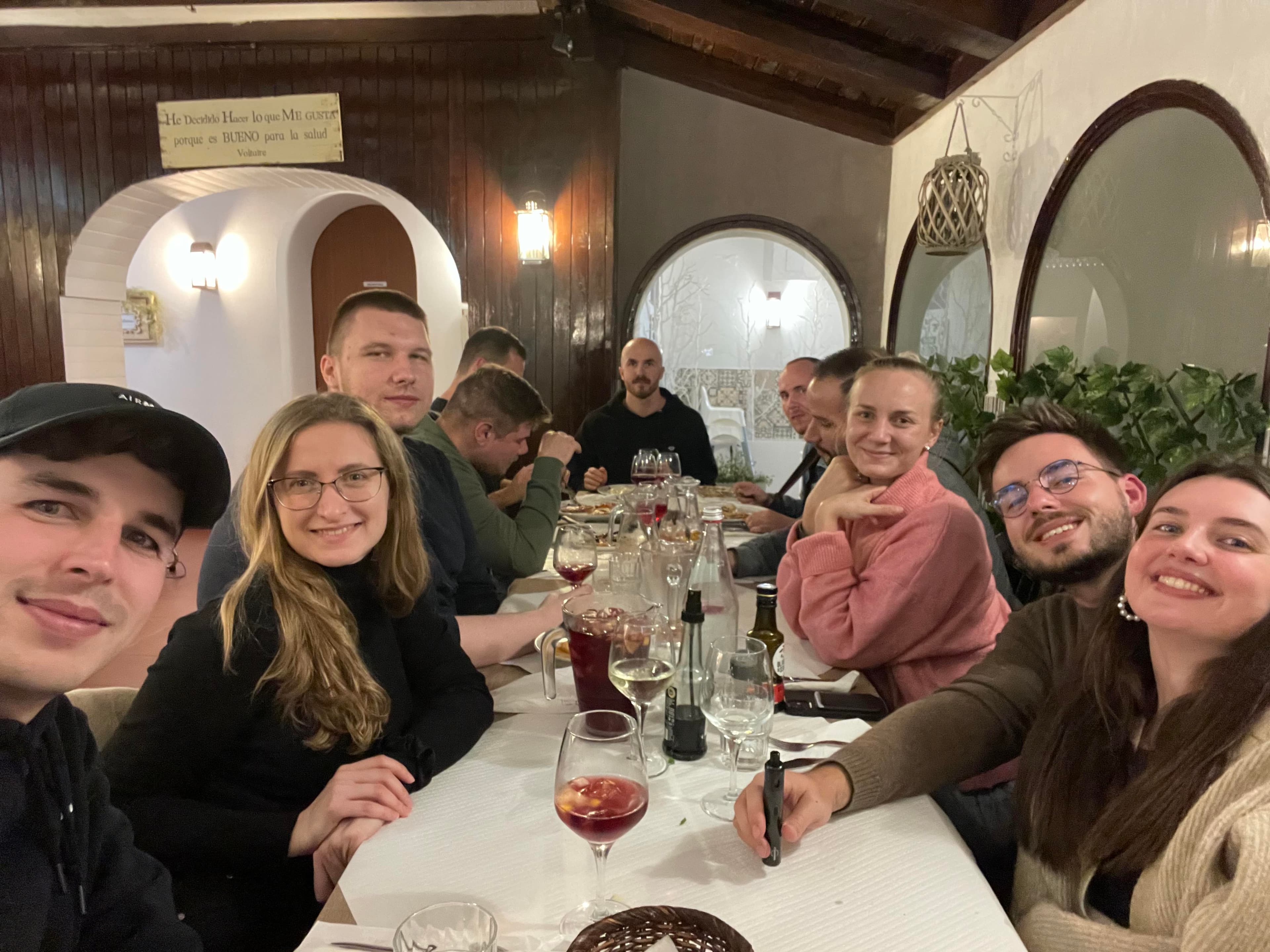 Friends having dinner and some wine in Lisbon